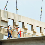 2men cutting rebar